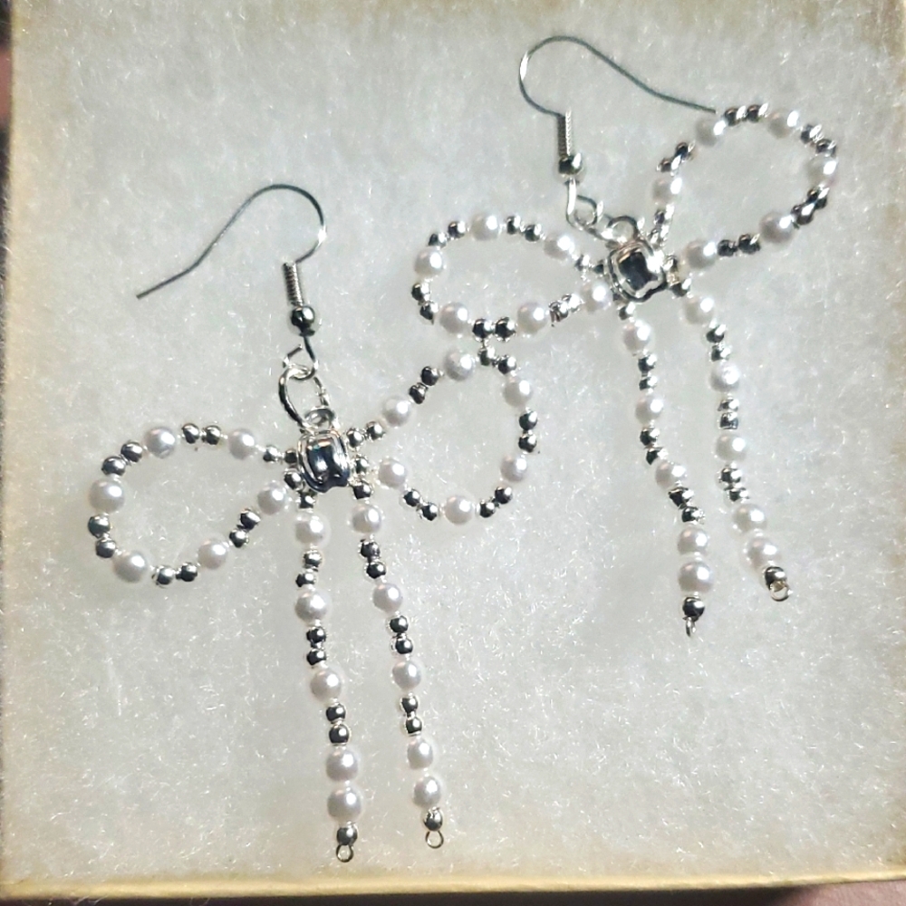 Elegant Silver and White Bow Earrings